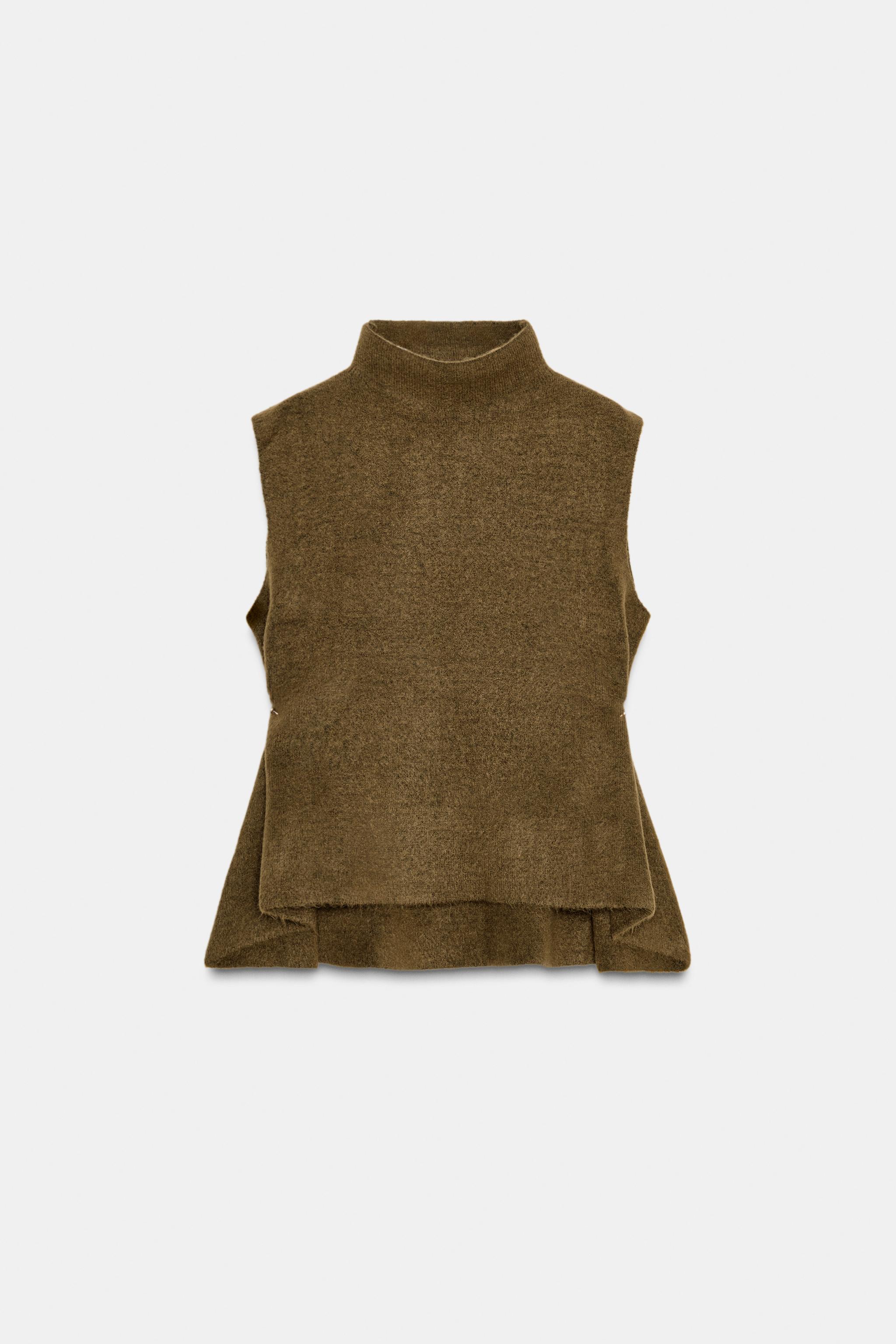 ASYMMETRIC KNIT TOP WITH SIDE APPLIQUÉS